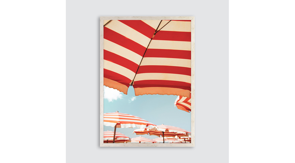 Obraz z grafiką z kolorowych parasoli na plaży