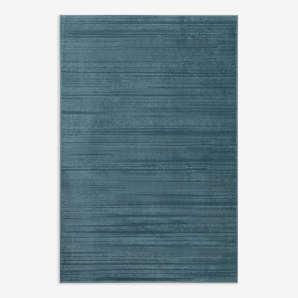 Dywan niebieski MAVIRA 160x240 cm wykonany z przędzy poliestrowej.  